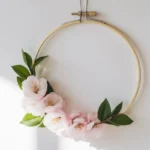 Bright living room with botanical wall art and light wood frames