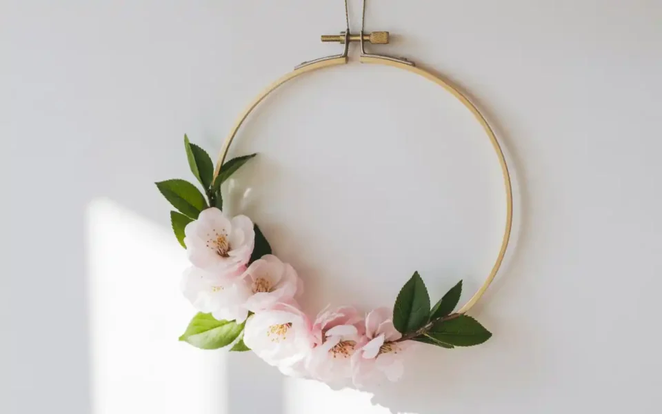 Bright living room with botanical wall art and light wood frames